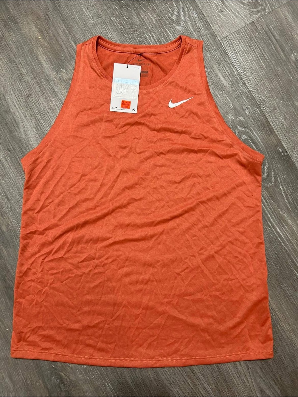 Nike Women’s Orange Athletic Tank with White Swoosh - Picture 1 of 1
